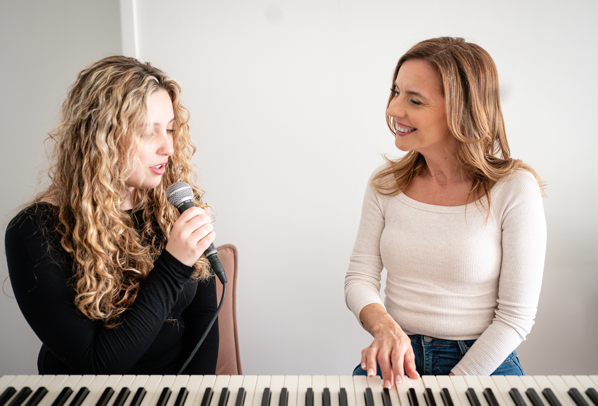 Aggie Gioftsidis teaching a piano and singing lesson to a student in Melbourne